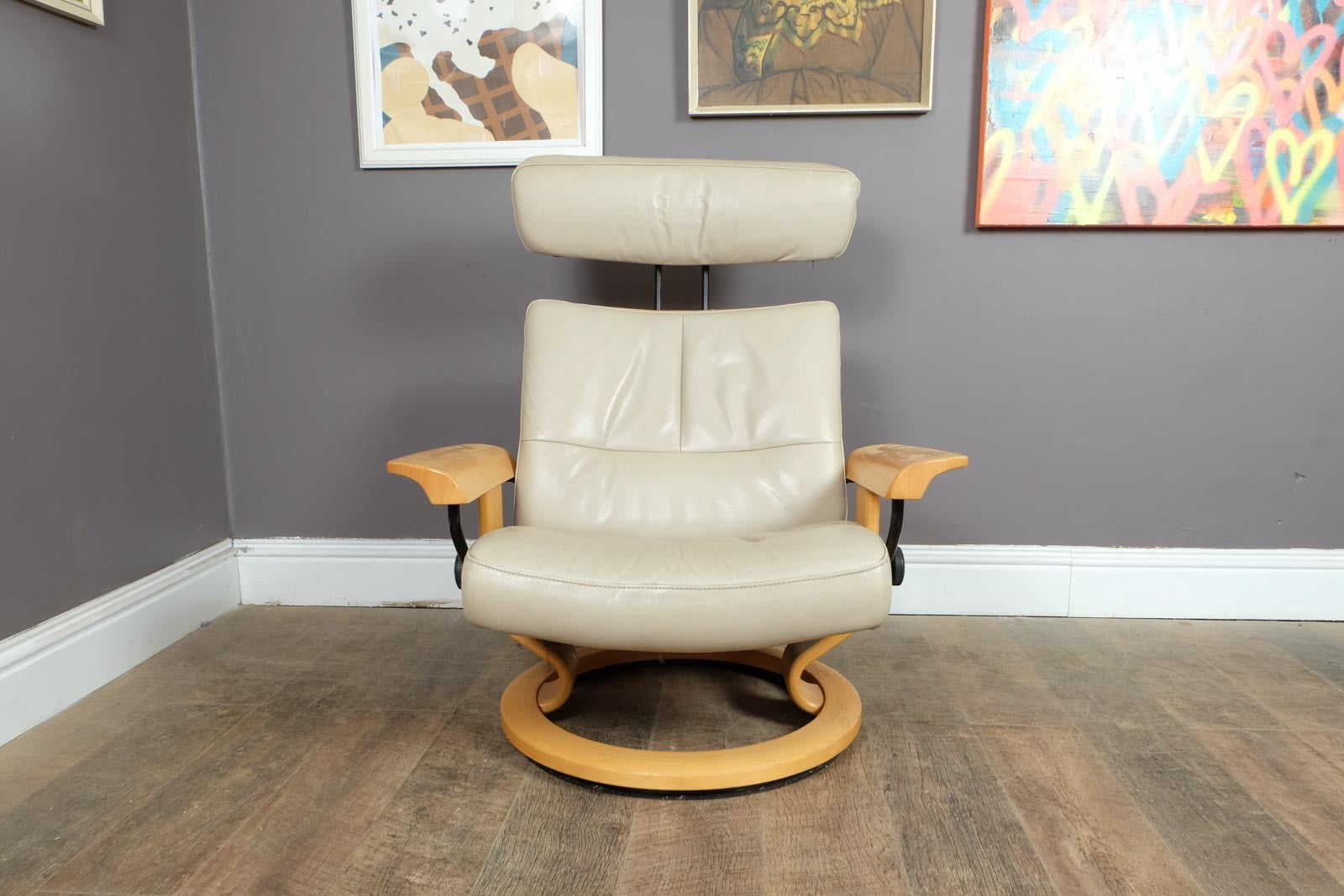 Vintage Stressless leather reclining armchair and footstool