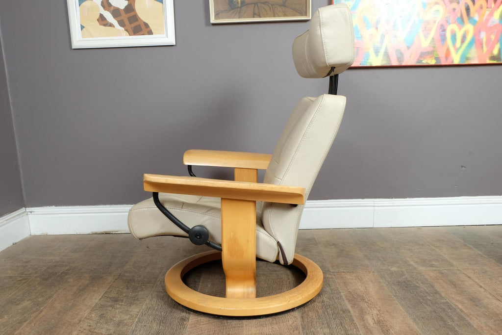 Vintage Stressless leather reclining armchair and footstool
