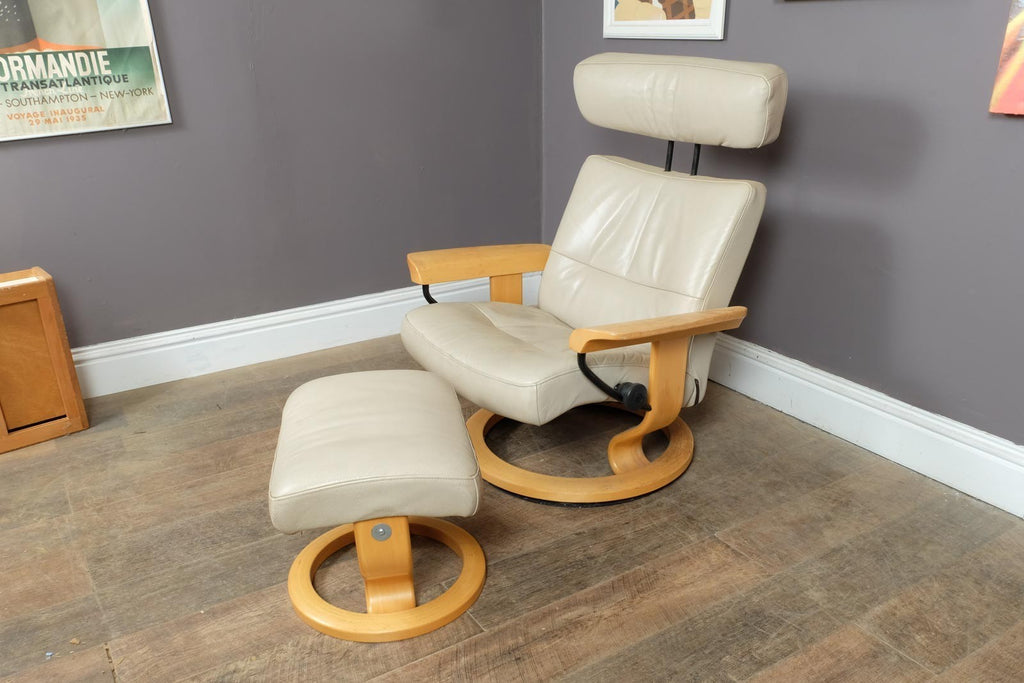 Vintage Stressless leather reclining armchair and footstool