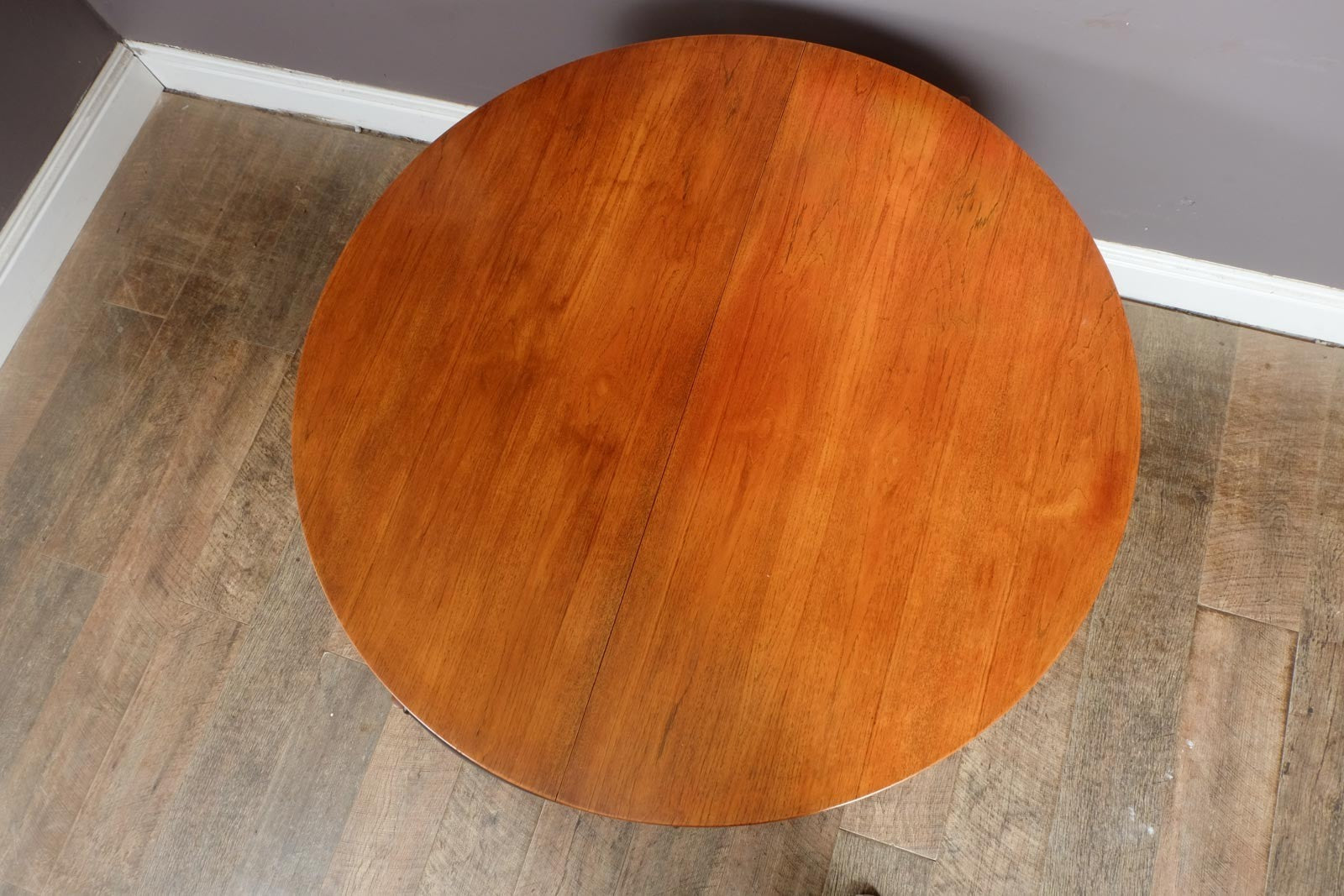 A H McIntosh Teak Extending Circular table and 4 Tuck Under Chairs